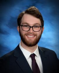 sam charney formal headshot